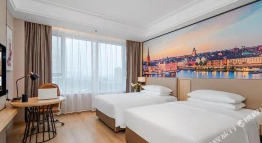 Vienna Hotel Tianjin Guizhou Road Branch Bagian luar foto